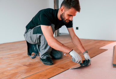 Experienced Crew Installing Hardwood Floors In A Scottsdale Home